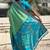 Pista green woven self design silk blend patola saree with blouse