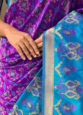 Purple woven self design silk blend patola saree with blouse 3
