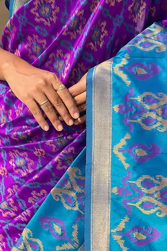 Purple woven self design silk blend patola saree with blouse