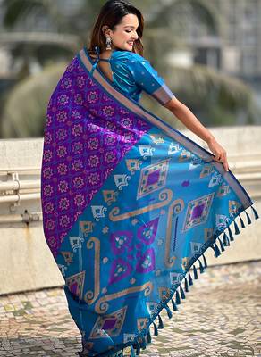 Purple woven self design silk blend patola saree with blouse 4