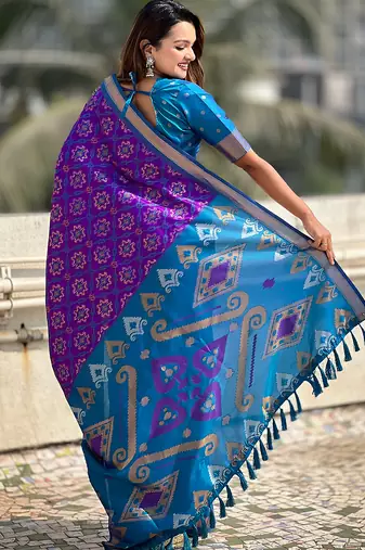 Purple woven self design silk blend patola saree with blouse