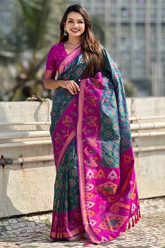 Teal green woven self design silk blend patola saree with blouse
