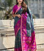 Teal green woven self design silk blend patola saree with blouse