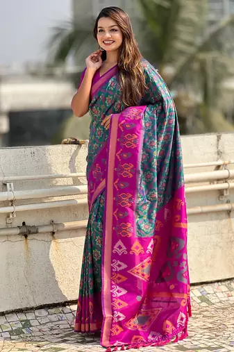 Teal green woven self design silk blend patola saree with blouse