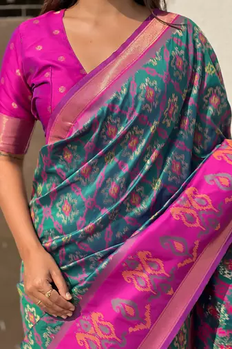 Teal green woven self design silk blend patola saree with blouse