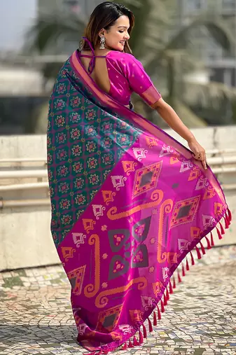 Teal green woven self design silk blend patola saree with blouse