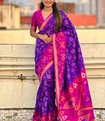 Violet woven self design silk blend patola saree with blouse