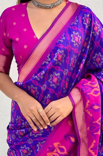 Violet woven self design silk blend patola saree with blouse