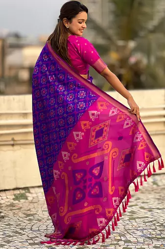 Violet woven self design silk blend patola saree with blouse