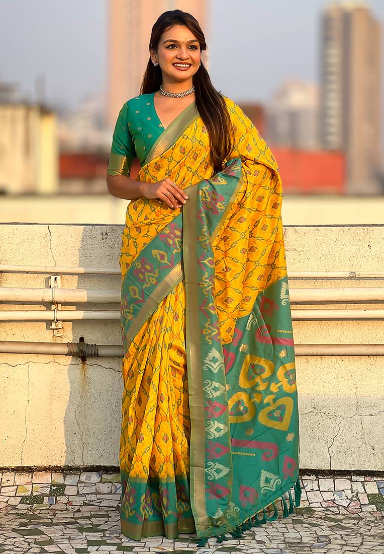 Yellow woven self design silk blend patola saree with blouse