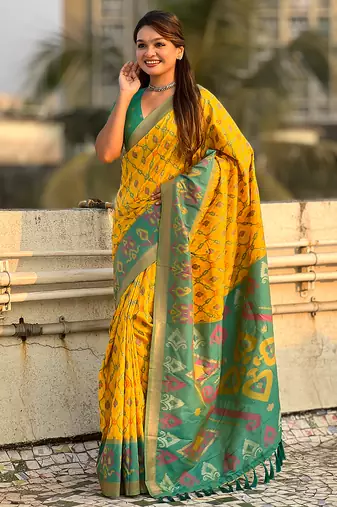 Yellow woven self design silk blend patola saree with blouse