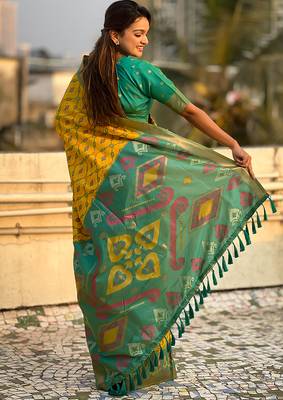 Yellow woven self design silk blend patola saree with blouse 4