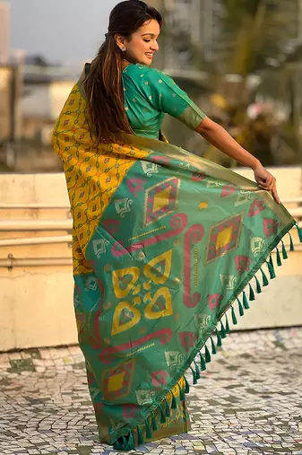 Yellow woven self design silk blend patola saree with blouse