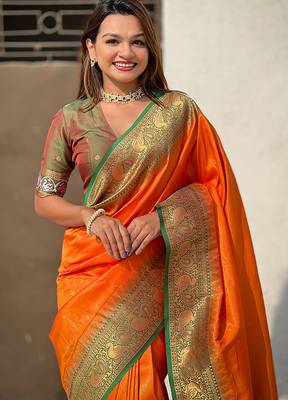 Orange woven self design tissue silk blend patola saree with blouse 2