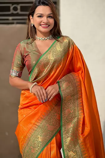 Orange woven self design tissue silk blend patola saree with blouse