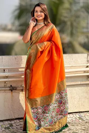 Orange woven self design tissue silk blend patola saree with blouse
