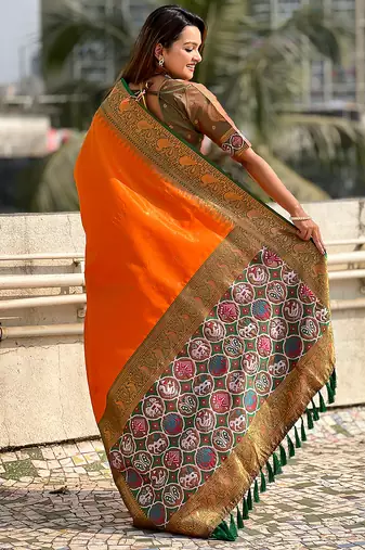 Orange woven self design tissue silk blend patola saree with blouse
