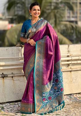 Purple woven self design tissue silk blend patola saree with blouse 1