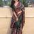 Dark green printed kolam silk printed saree with blouse