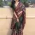 Dark green printed kolam silk printed saree with blouse