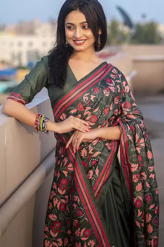 Dark green printed kolam silk printed saree with blouse