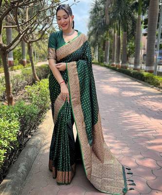 Green woven self design banarasi katan silk blend banarasi saree with blouse 1