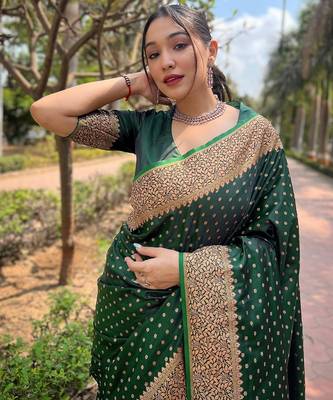 Green woven self design banarasi katan silk blend banarasi saree with blouse 2