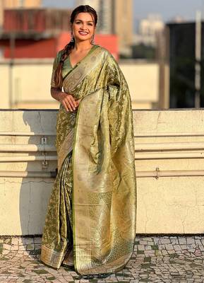 Pista green woven self design antique silk blend banarasi saree with blouse 1