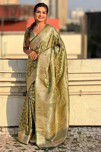 Pista green woven self design antique silk banarasi saree with blouse