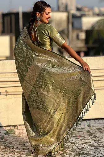 Pista green woven self design antique silk banarasi saree with blouse