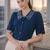 blue embroidered collar puff sleeve button-down top