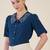 blue embroidered collar puff sleeve button-down top