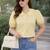 Women’s yellow solid top with ruffle peter pan collar & puff sleeves | stylish casual & party wear blouse