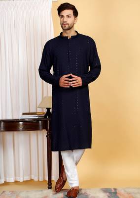 Elegant dark blue kurta set with sequins detailing 1