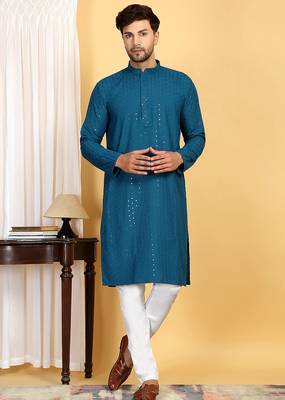 Turquoise embroidered kurta set with sequins highlights 1