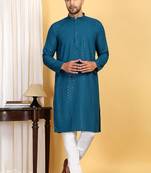 Turquoise embroidered kurta set with sequins highlights