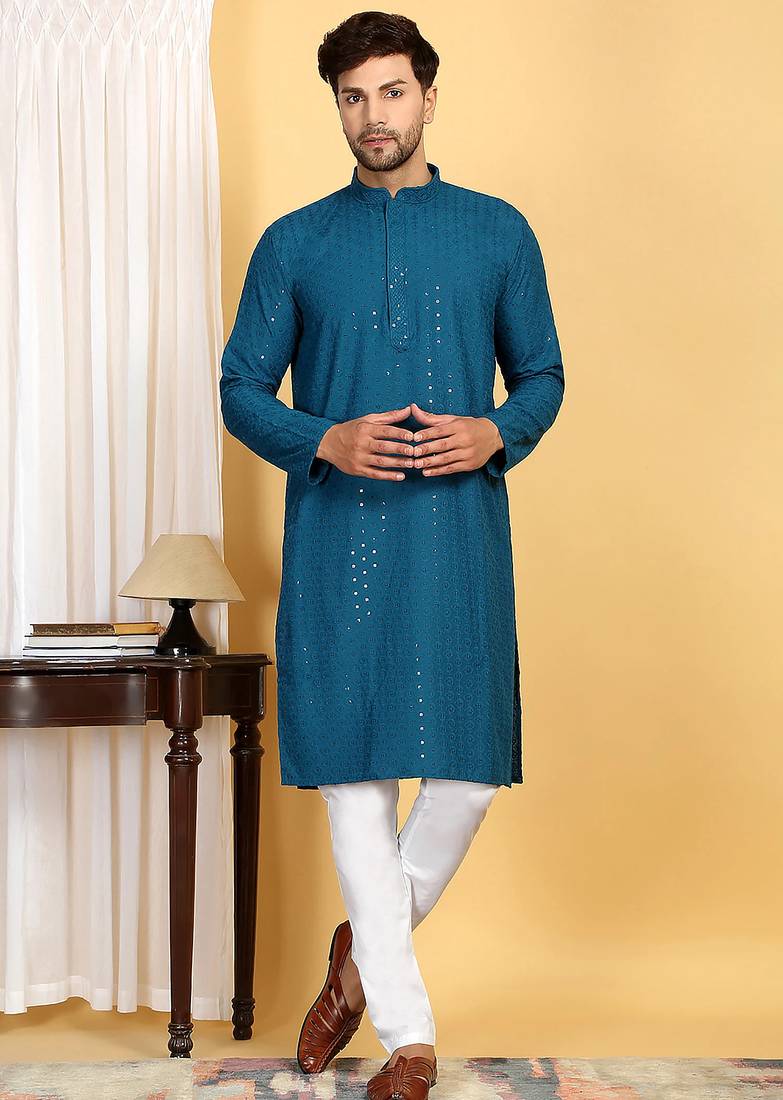 Turquoise embroidered kurta set with sequins highlights
