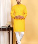 Yellow embroidered kurta set with sequins highlights
