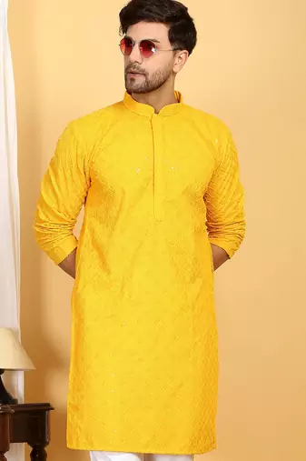 Yellow embroidered kurta set with sequins highlights