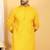 Yellow embroidered kurta set with sequins highlights