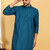 Turquoise embroidered kurta set with sequins highlights