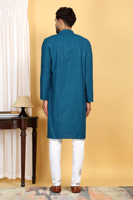 Turquoise embroidered kurta set with sequins highlights 4