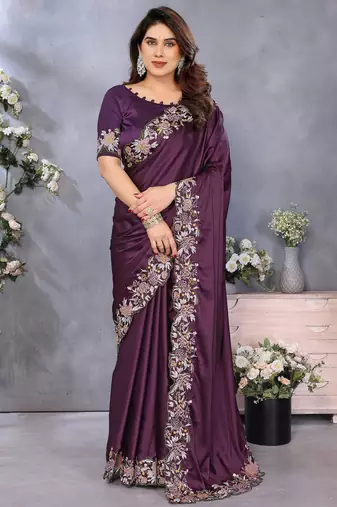 Purple soft satin saree with embroidered border and matching blouse piece
