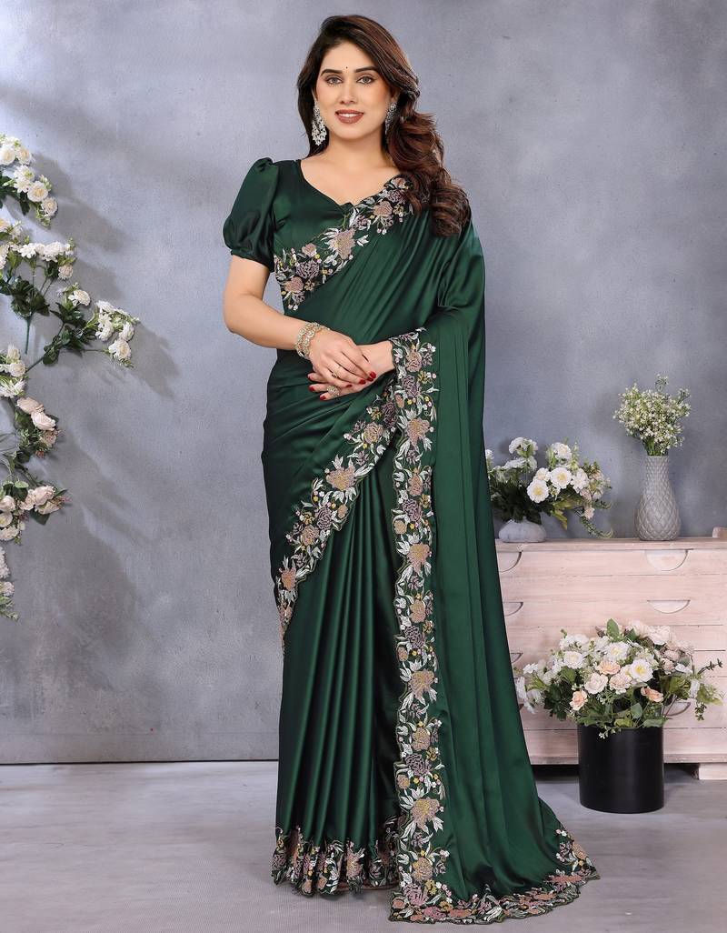 Green soft satin saree with embroidered border and matching blouse piece