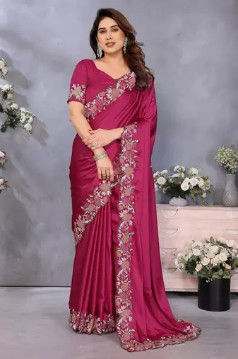 Pink soft satin saree with embroidered border and matching blouse piece