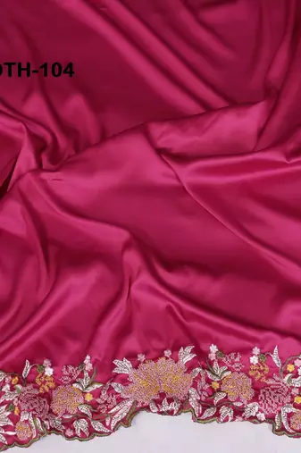 Pink soft satin saree with embroidered border and matching blouse piece