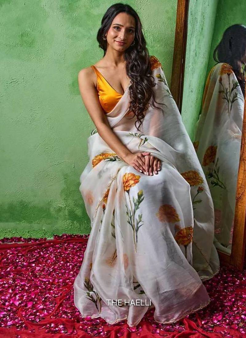 White color print and khatali handwork work organza saree