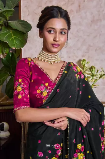 Black color flower print with handwork cut dana work organza saree