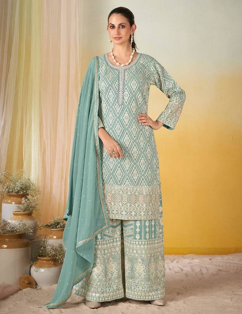Light blue real georgette wedding collection full stitched sharara suits free size upto 42