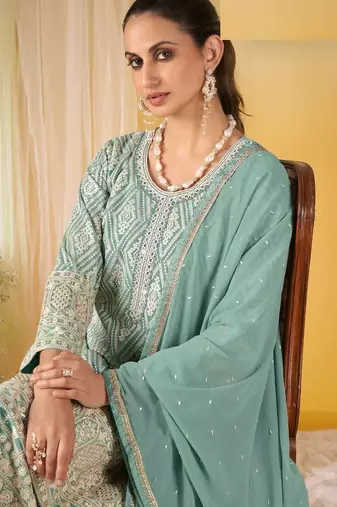 Light blue real georgette wedding collection full stitched sharara suits free size upto 42